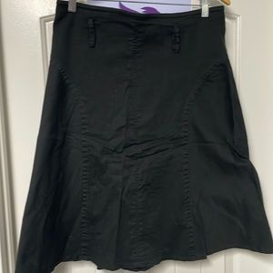 Black denim skirt, below the knee
